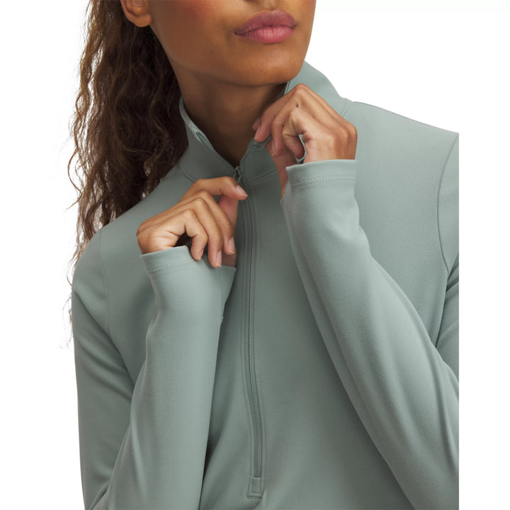 UA Women’s Motion Half Zip - Silica Green 2