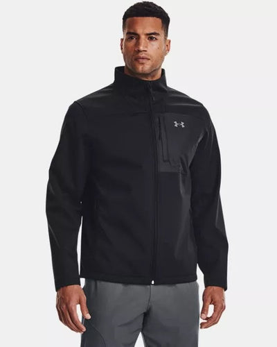 a man wearing a black jacket and pants for the mens collection