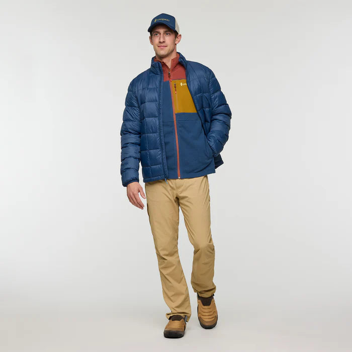 guy wearing Cotopaxi Mens Abrazo Fleece Full-Zip Jacket Nutmeg and Deep Sea full view
