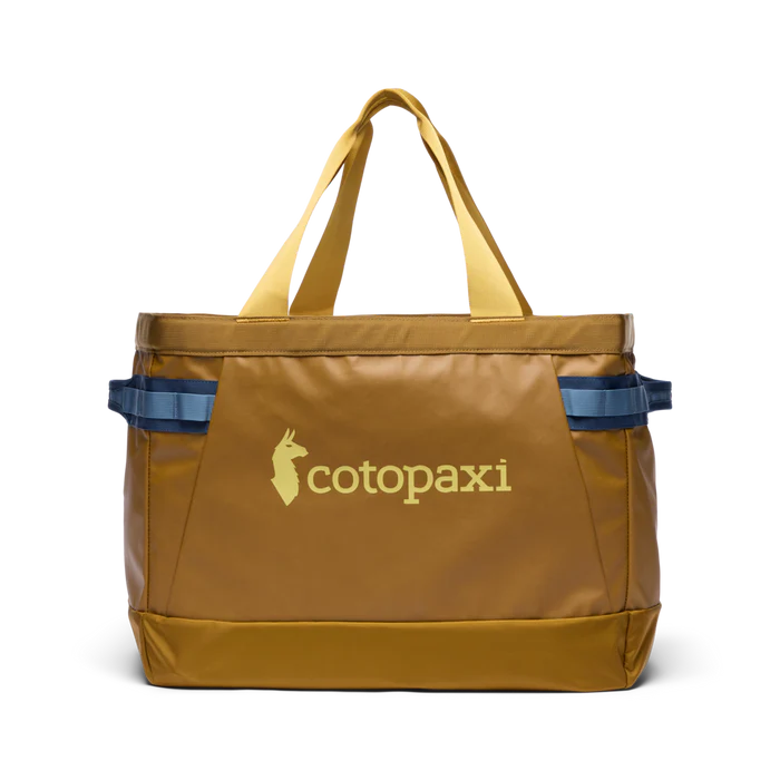 Brown tote bag with 'cotopaxi' logo on a white background
