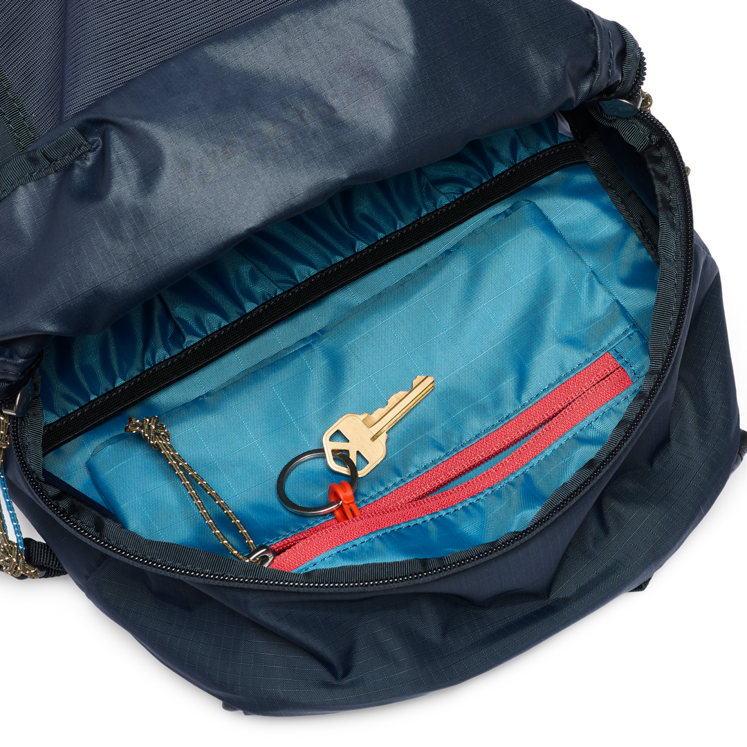 Cotopaxi Elqui 18L Backpack in Carbon and Kale colorways shown from multiple angles - View 3