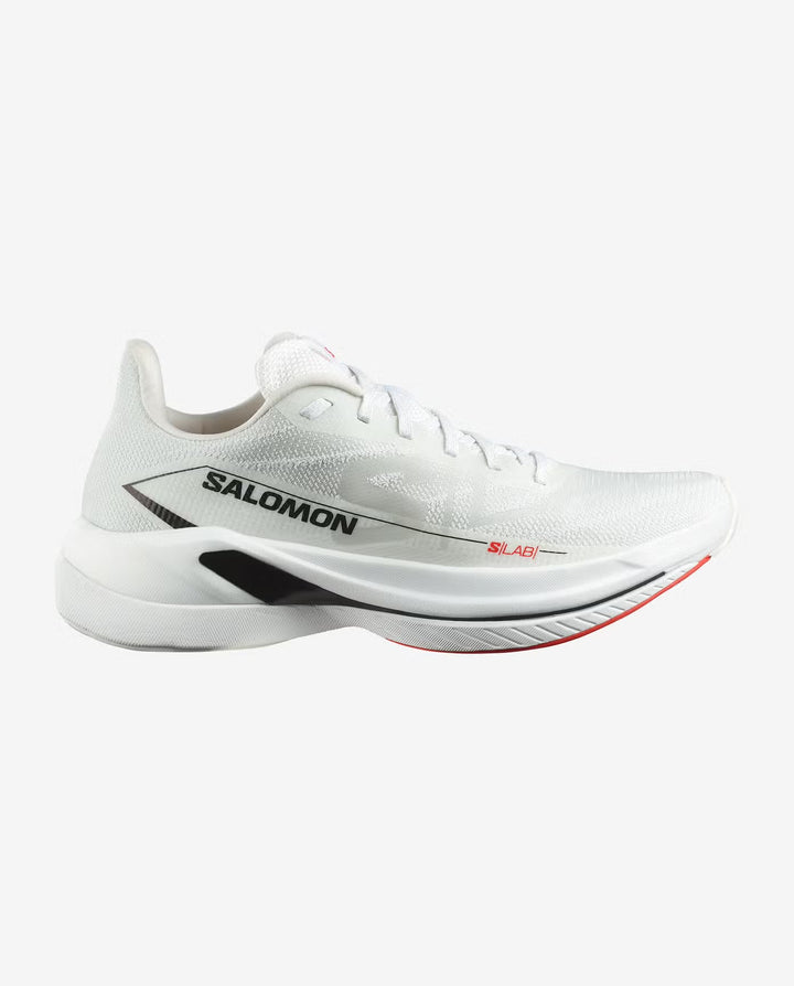 White running shoe with black and red accents on a white background