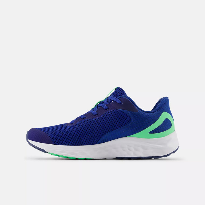 Blue running shoe with green accents on a light gray background