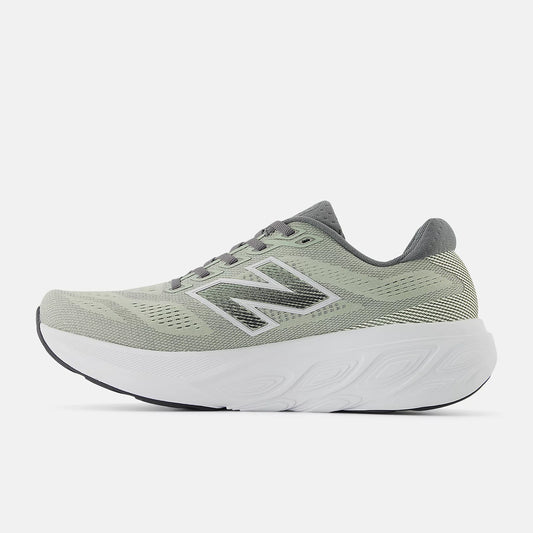 Green running shoe with New Balance logo on a white background 1