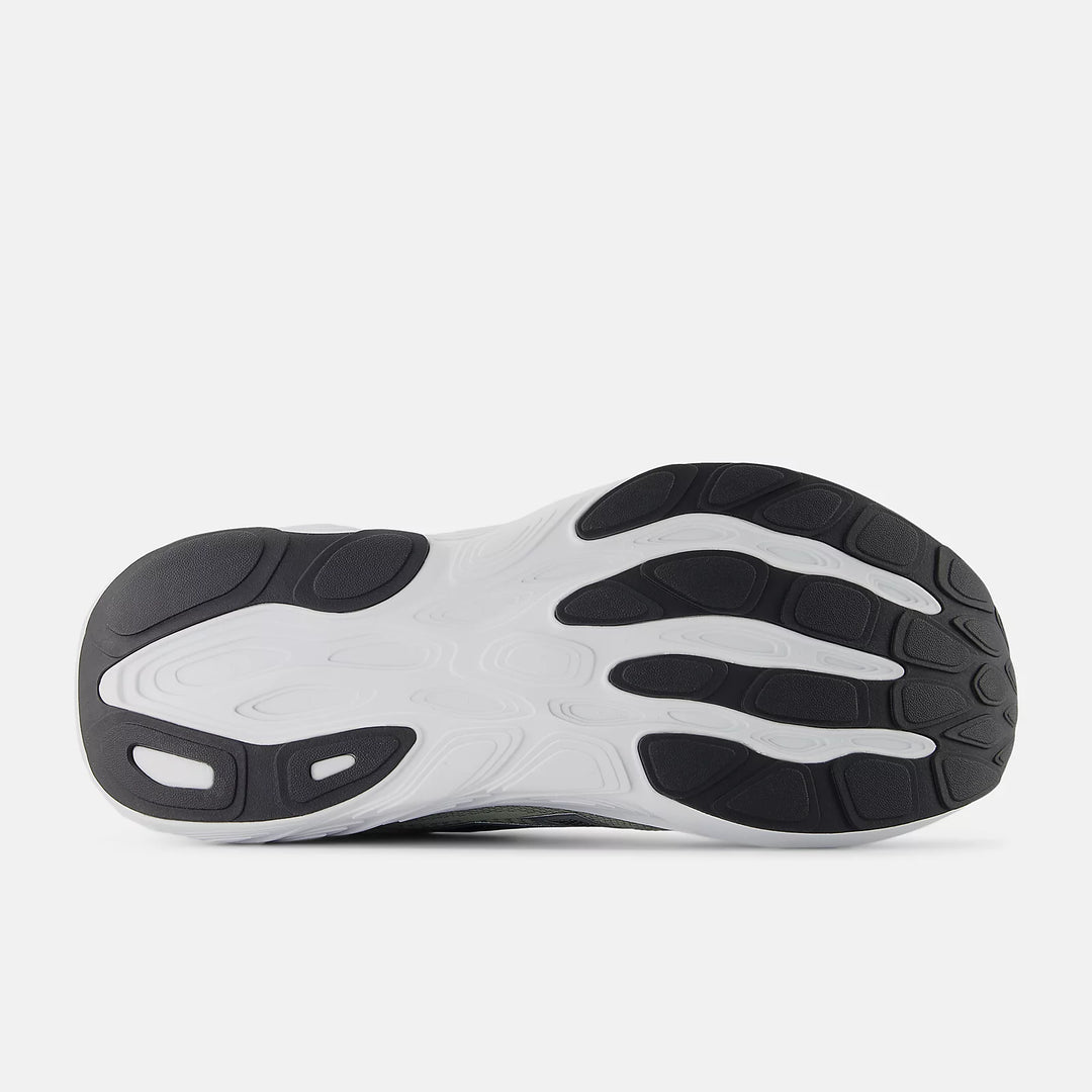 Black and white sole of a shoe on a light gray background
