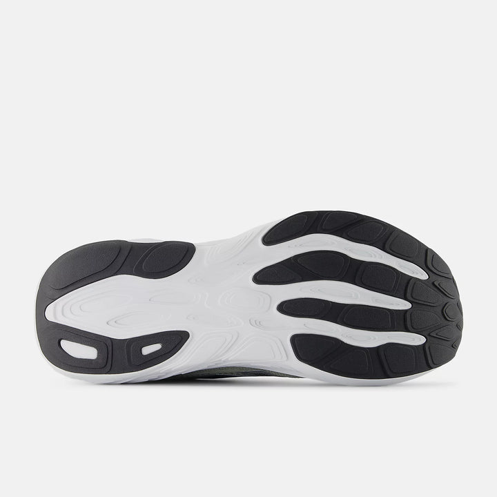 Black and white sole of a shoe on a light gray background