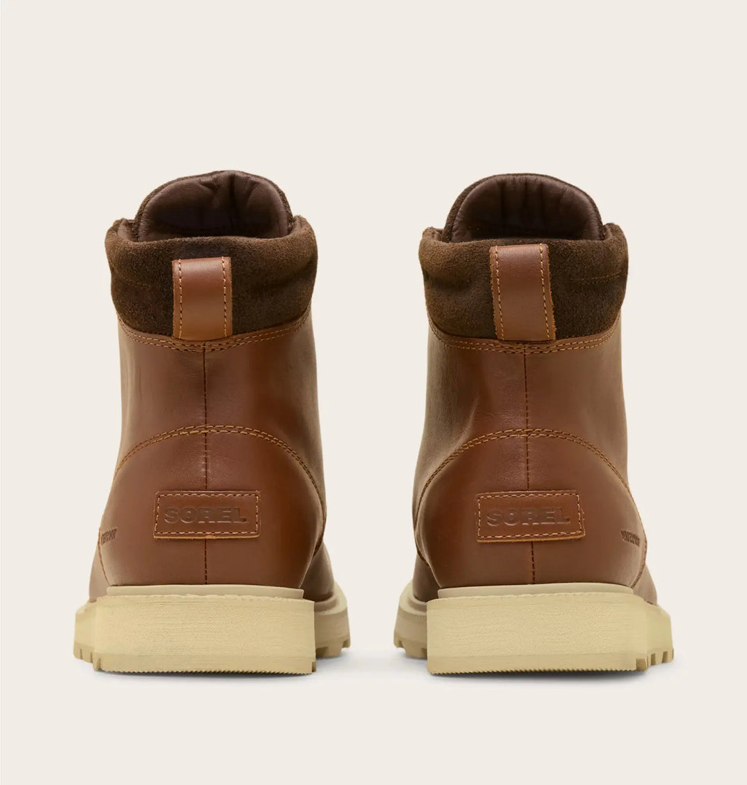 Sorel Madson Mac toe Men's Boot back view on a light beige background