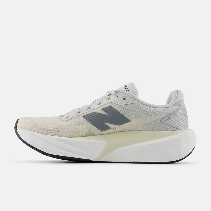 White running shoe with New Balance Fuel Cell Rebel V5 6