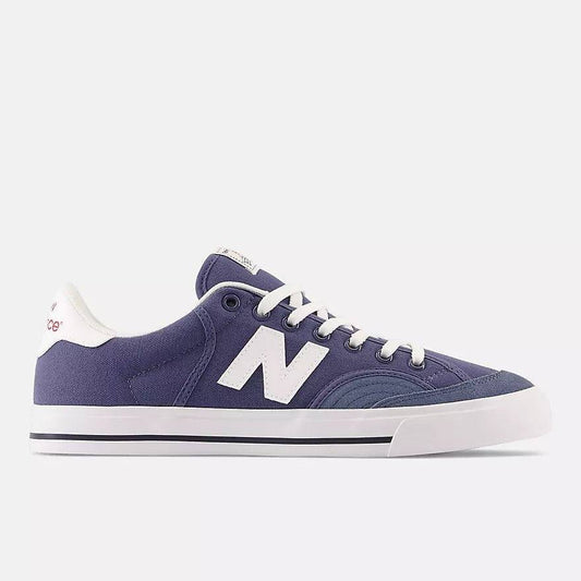 Blue and white New Balance Numeric 212 Pro Court sneakers